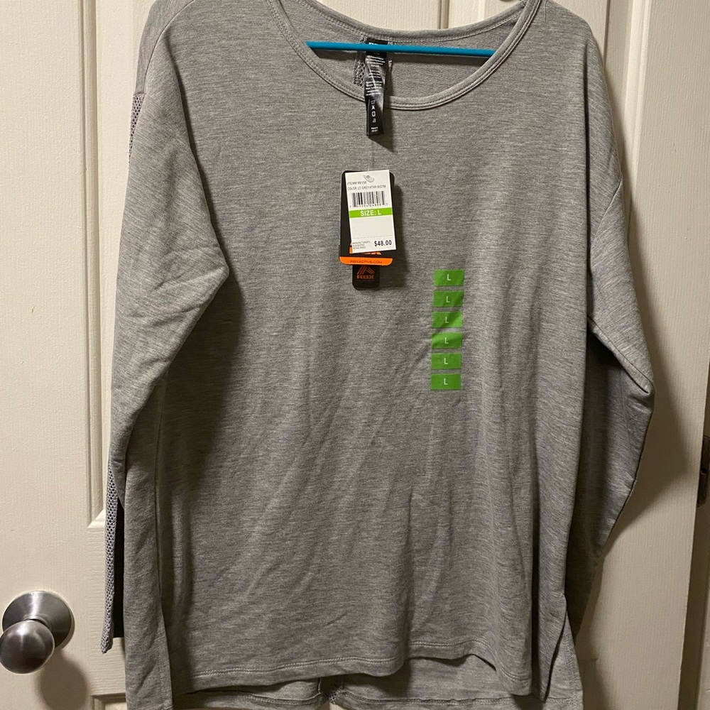 Woman’s Large long sleeve brand new with tags